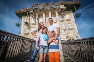 Family at WonderWorks Myrtle Beach, the upside-down house