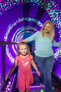 Family walking through spinning tunnel at WonderWorks Myrtle Beach 