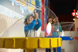 Family making giant bubbles at WonderWorks Panama City Beach